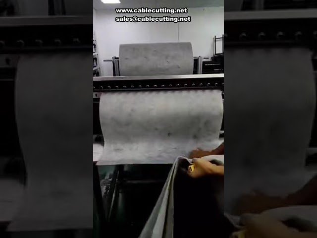 フロッキング不織布自動裁断機 | 高精度エッジカット・端切れ防止対応