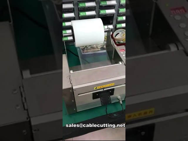 幅200mm対応！電動工業用テープカッターディスペンサー ZCUT-2 | 高速・高信頼性の自動封緘機