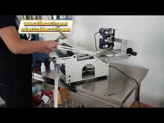 PET・ガラス製丸型ワインボトル用ラベリングマシン（コード・日付・ロット番号印刷機能付き）